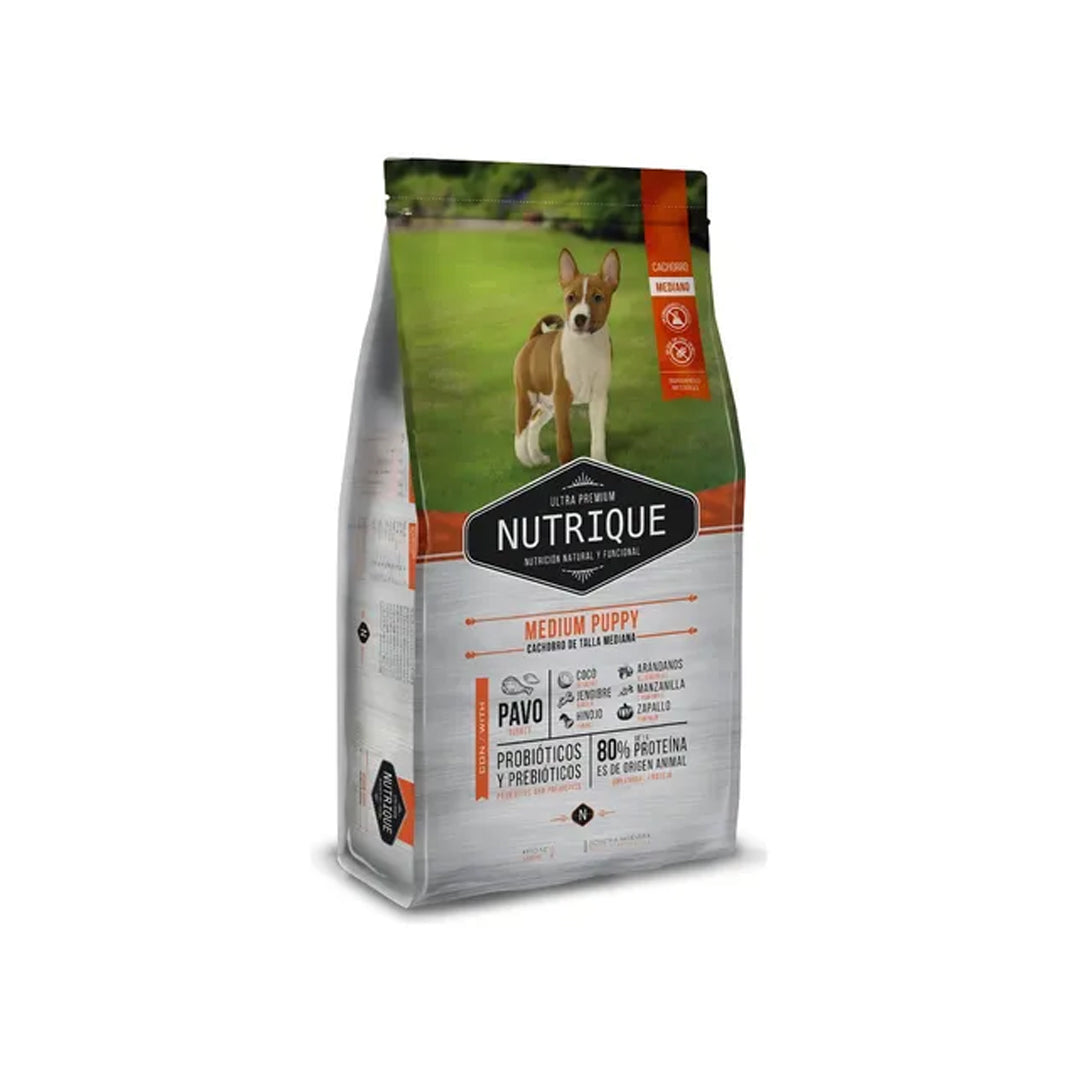 Alimento seco Nutrique para cachorro mediano con pavo, 12kg, para salud oral y nutrición en alimentos y snacks de ventas pet.